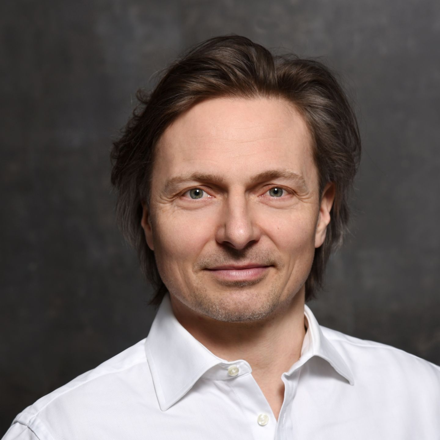 Cybersecurity expert Janusch Skubatz, Chief Information Security Officer of the EOS Group, with brown hair and white shirt